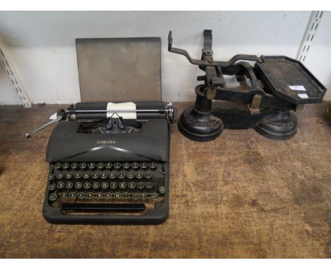 A Corona typewriter and a set of weighing scales 