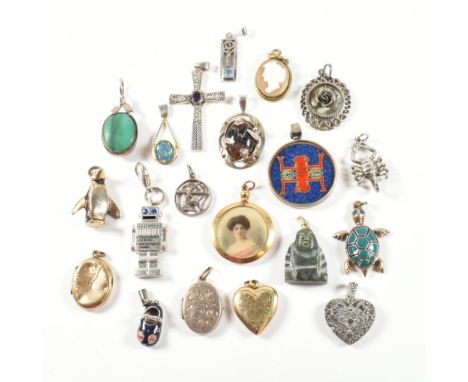 A collection of vintage and later pendants. The mixed lot of necklace pendants to include approximately twenty pendants to in