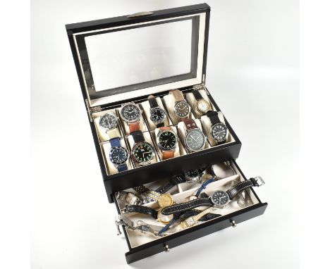 A collection of vintage and later wrist watches. The mixed lot to include approximately twenty one wrist watches with stainle