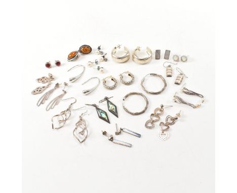 A large collection of silver and gem set earrings. The lot to include eighteen pairs of earrings. The earrings to include, bu