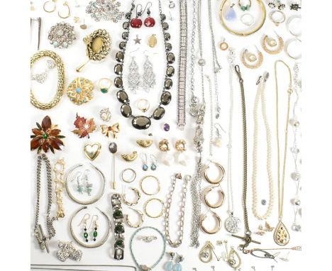 A collection of costume jewellery. The jewellery to include silver, rolled gold, gold tone metal, earrings, bracelets, brooch