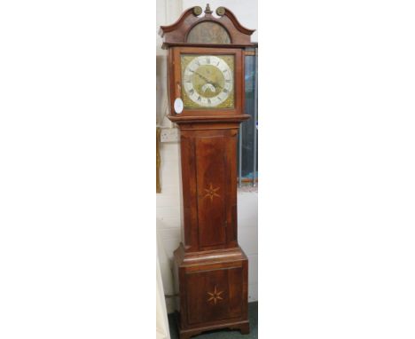A thirty hour long case clock by F Cottell of Crewkerne with engraved brass and silvered dial. The Roman chapter has an outer