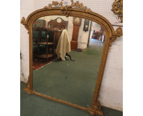 Victorian arch topped overmantel mirror, gilt gesso bead and twist frame with acanthus scrolls and wreath surmount, (glass he
