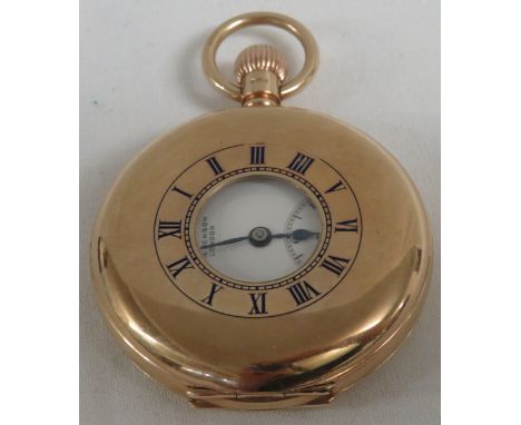 9 carat gold half hunter pocket watch, crown winding, white enamel dial with Roman chapter and subsidiary Arabic seconds dial