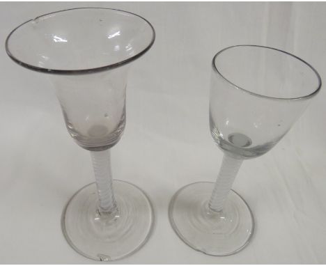 Two first period 20th century hand blown helix stemmed wine glasses, height 14.5cm and 16.2cm