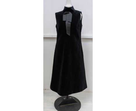 A black velvet dress and jacket by Dior, off the peg Dior, circa 1960's, the dress is a shift style, with a rolled collar, an