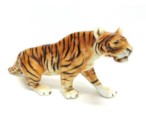 A LARGE CERAMIC FIGURE OF A TIGER,  in the manner of Royal Dux but lacking pink triangle, inscribed '312/3' and impressed 'Cz