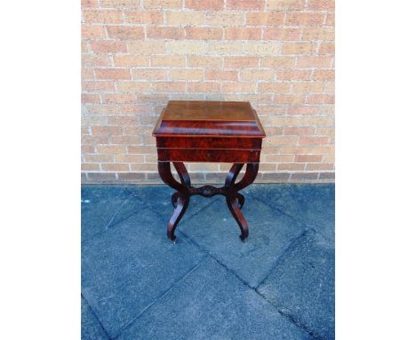A 19TH CENTURY MAHOGANY WORK TABLE,  the caddy top opening to fitted satin birch interior, on shaped supports united by stret