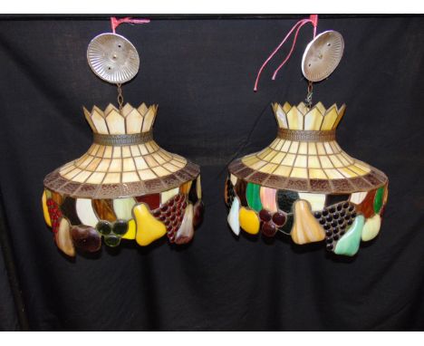 A PAIR OF LEADED AND STAINED GLASS CEILING LIGHT FITTINGS,  decorated with a continuous band of fruit, 45cm diameter