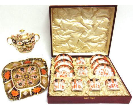 A ROYAL CROWN DERBY CASED SET OF SIX COFFEE CANS AND SAUCERS,  decorated in the 2712 Imari pattern; together with a twin hand