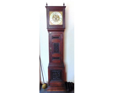 A LONGCASE CLOCK the steel and brass dial signed 'Rich.Stubbs, London', with chiming movement contained in a tall carved case