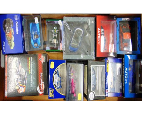 TWELVE ASSORTED 1/43 SCALE MODEL CARS each mint or near mint and boxed.