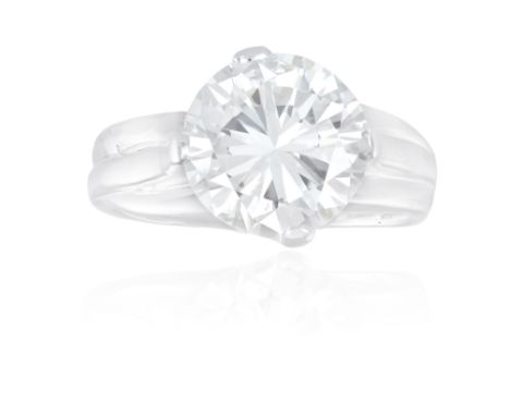 A SINGLE-STONE RINGThe round brilliant-cut diamond weighing 3.60cts within a four-claw setting, to a trifurcated plain hoop, 