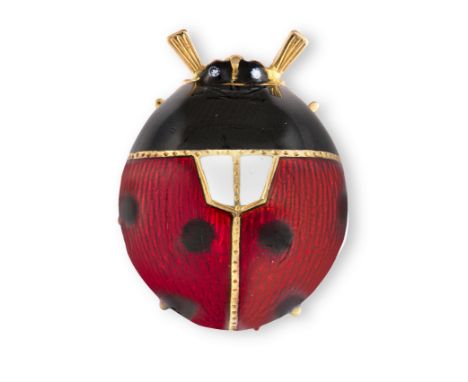 AN ENAMEL NOVELTY BROOCHDesigned as a ladybird, the body and wing cases decorated with black, white and red enamel, mounted i