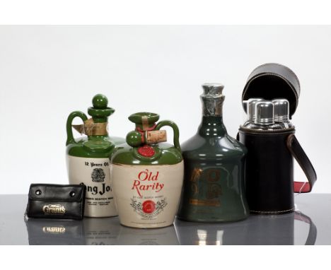 MOD 94 DHUNOMHAINN
Scotch Whisky by Eilean Alba Licear Co, Taigh-na-Bruaiche, in green Buchan ceramic decanter. 70cl, 40% vol