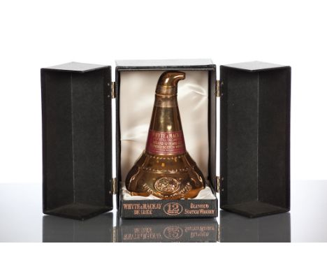WHYTE & MACKAY POT STILL DECANTER
De Luxe Blended Scotch Whisky, aged 12 Years. Labelled for the Italian market. 1 Litre, 43 