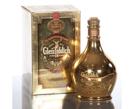 GLENFIDDICH SUPERIOR RESERVE 18 YEAR OLD 
Single Highland malt whisky, in ceramic golden decanter. 750ml, 43% volume. In cart