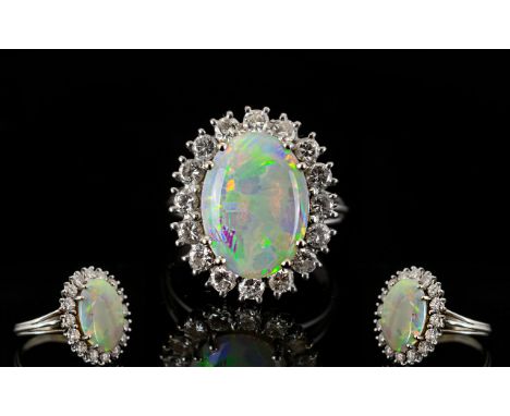 18ct White Gold Attractive Diamond and Opal Set Cluster Ring, Flower head Design, with Full Hallmark for 18ct. The Large Opal