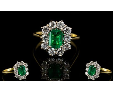 18ct Gold Superb Emerald and Diamond Set Cluster Ring - flower head setting. The whole of pleasing form. The octagonal cut em