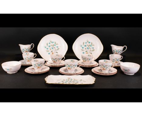 Tuscan Bone China 'Blue Star' Part Tea Service.  Comprises 11 Teacups, 12 saucers, 12 small cake/sandwich plates, 2 large cak