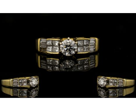 Ladies 18ct Gold Superb Quality Baguette And Brilliant Cut Diamond Set Dress Ring Fully hallmarked, the central round brillia