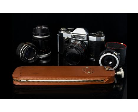 Praktica Nova 8 35mm Camera Complete with black pebbled leather carry case, telescopic lens, three other lenses, cable releas