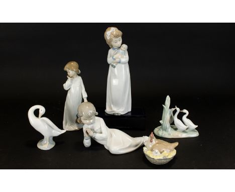 A Collection Of Four Nao And One LLadro FigureS to include girl with doll, girl with ragdoll, girl at prayer, hen and chicks,