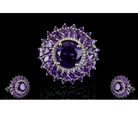 Amethyst 'Sunflower' Statement Ring, a central, round cut amethyst of 3ct, set above a milgrain frame, encircled by a band of