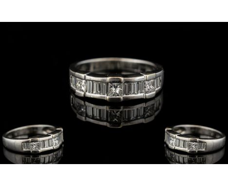 Contemporary Designed Nice Quality 18ct White Gold Diamond Set Ring. The Princes Cut of Baguettes Cut Diamond of Excellent Co