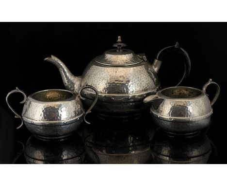 Three Piece Planished Pewter Tea Service Each with central faux riveted band, marked to base 'Halo, England Pewter 0779' each