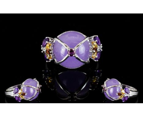 Purple Jade, Amethyst, Garnet and Citrine Ring, a 13.5ct round cabochon cut purple jade covered with an X cage topped with a 