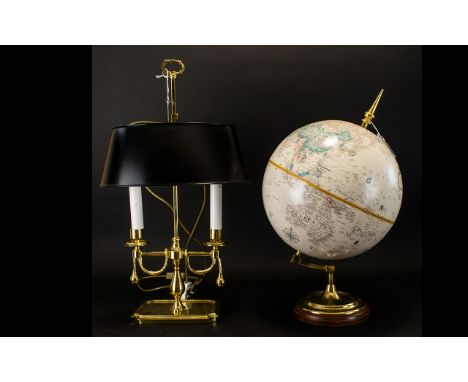 A Replogle 12 Inch Diameter Globe World Classic Series Brass mounts on wooden base. Together with a twin light lacquered bras