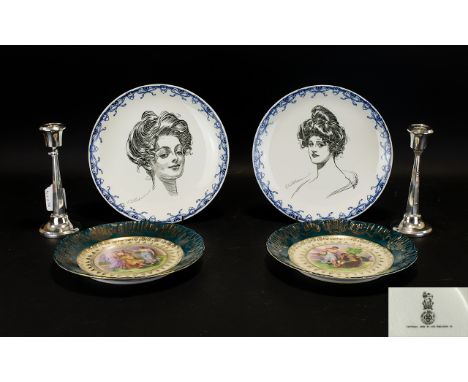 Royal Doulton A Rare Pair Of Gibson Girl Portrait PlatesEach in good condition, post 1901, each printed in black with a girl'