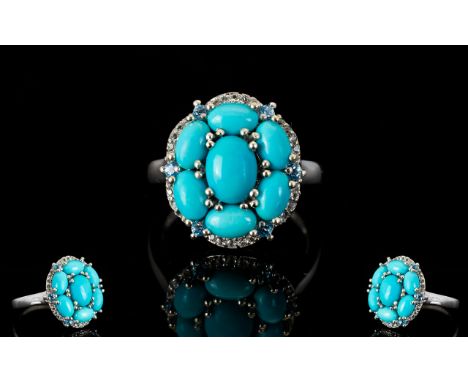 Sleeping Beauty Mine Turquoise Cluster Ring, six oval cut turquoise surrounding a 1ct oval cut, similar, to the centre, mined