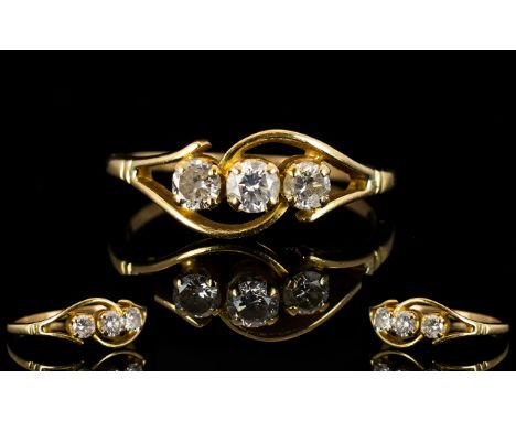 18ct Gold Three Stone Diamond Ring Set with three round brilliant cut diamonds, stamped 750, ring size U, estimated diamond w