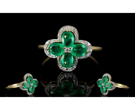 Emerald and White Zircon Quatrefoil Ring, four oval cut emeralds, totalling 1.2cts, in a quatrefoil shape, centred by a natur