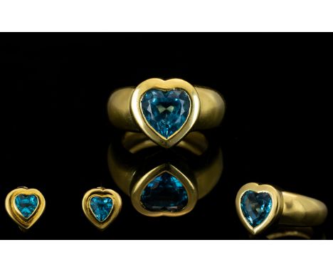 18ct Yellow Gold Attractive And Well Made Blue Topaz Set Dress Ring And Matching Earrings Each fully hallmarked 750- 18ct. Th