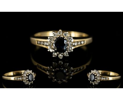 Ladies - 9ct Gold Sapphire and Diamond Cluster Ring, with Extended Diamond Shoulders. Flower head Design. Full Hallmarks for 