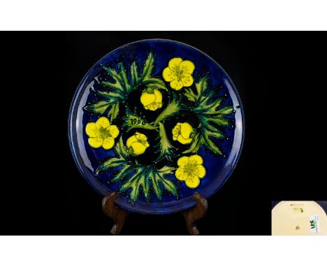 Moorcroft Modern Tubelined Limited Edition Cabinet Plate 'Buttercups' design on blue ground.  Dated 1990.  Designer Sally Tuf