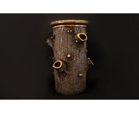 Antique Bretby Tree Trunk Umbrella Stand Unmarked in the form of a textured earthenware tree trunk, height 22 inches, dia 12 