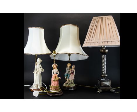 Three Contemporary Decorative Figural Lamps Two with shades, together with one other column lamp, all in good condition, plea