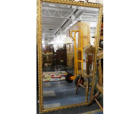 A Large Gilt Framed Bevel Edge Wall Mirror with Pierced Moulded Frame, 76cm x 135cm 