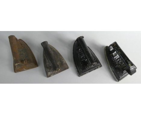 A Collection of Four Vintage Cast Iron Flat Irons 
