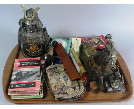 A Tray of Curios to Include 1960's British Rail Locomotive Trainspotters Books, Samurai Armour Decorated Japanese Whisky Bott