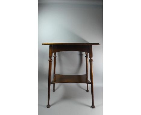 An Edwardian Mahogany Rectangular Topped Occasional Table with Stretcher Shelf On Tapering Turned Supports, 59cm Wide 