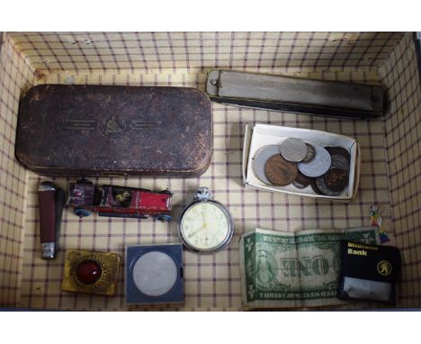 A Vintage Case Containing Harmonica, Coins and Bank Note, Tin Plate Racing Car, Jewelled Match Box, Pocket Knife etc 