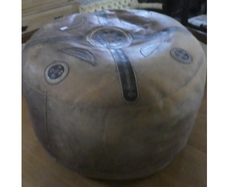 An African Circular Leather Pouffe 
