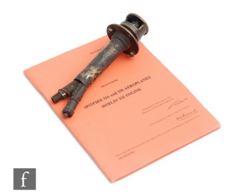 A World War Two brass priming pump for a Spitfire 11A engine, stamped 1941, with a later copy of pilot's notes titled Spitfir