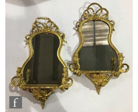 A pair of 19th Century gilt painted pine and gesso girandole wall brackets, each with a tied ribbon pediment over a cartouche