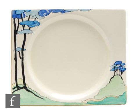 A Clarice Cliff Biarritz side plate circa 1934, hand painted in the Blue Firs pattern with a stylised tree lined landscape, B